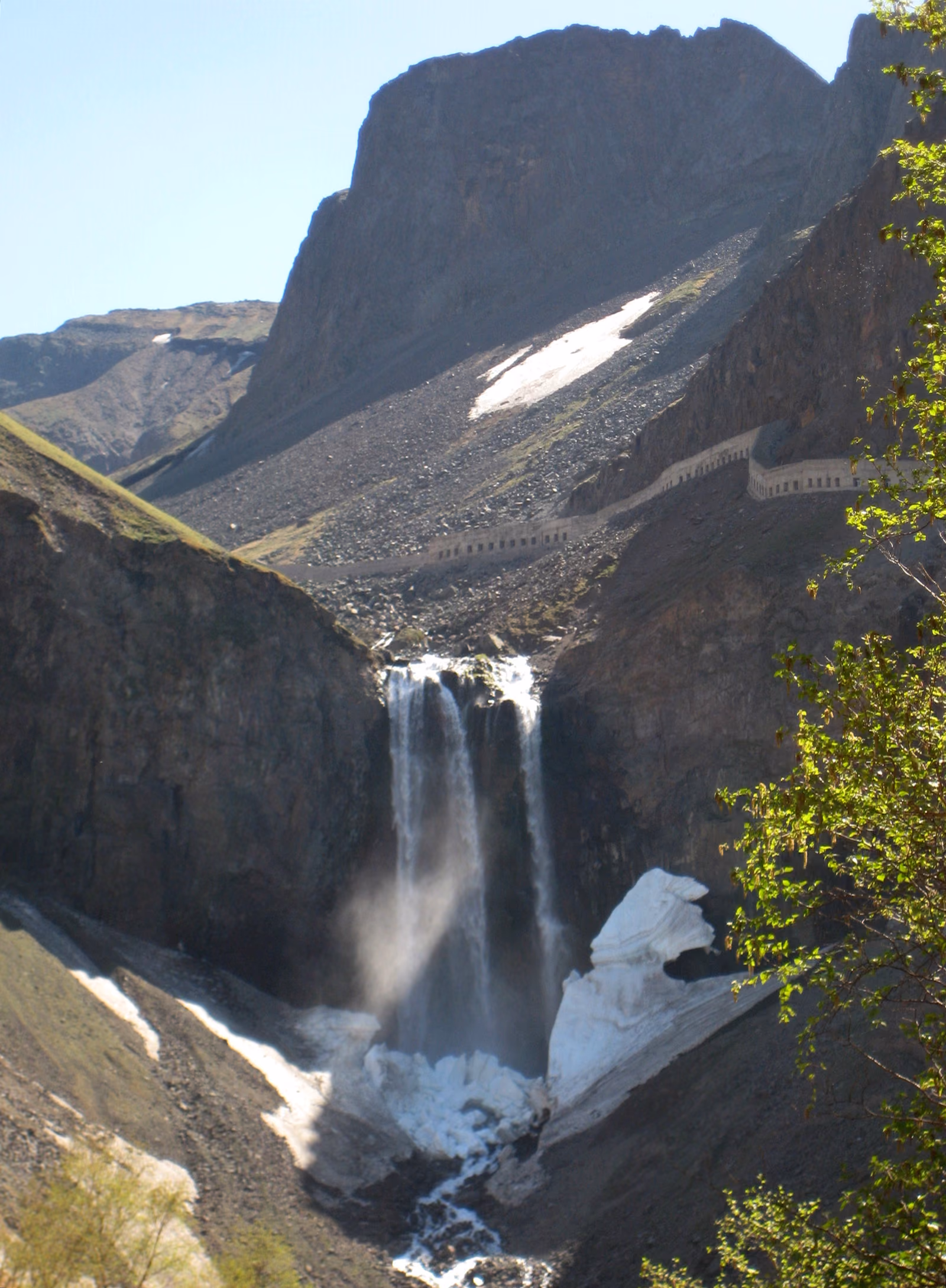 A second view of Changbai Waterfall descending through volcanic terrain