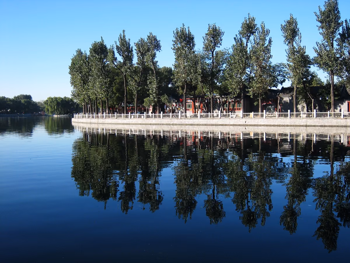 The lakeside promenade and reflections at Shichahai, Beijing