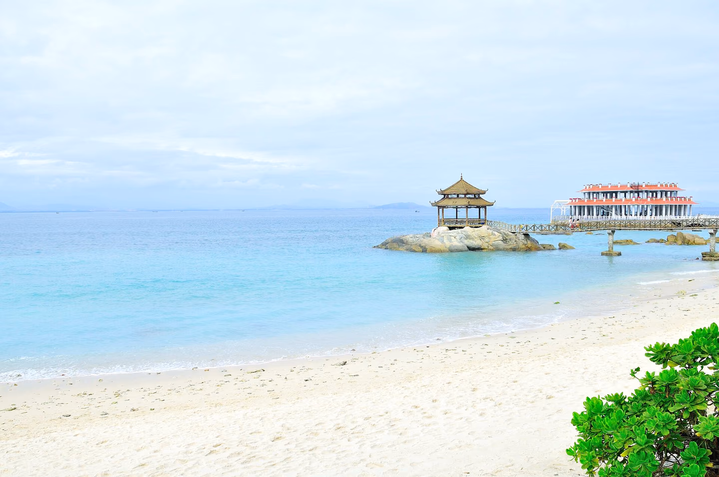 Clear water and tropical shoreline at Wuzhizhou Island near Sanya
