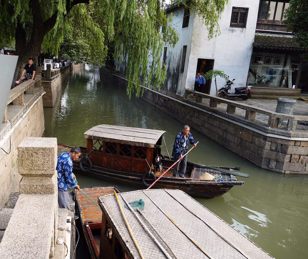 Canal boats and waterside houses along Pingjiang Road, Suzhou